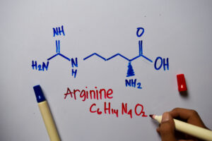 Chemical structure of the amino acid arginine drawn on whiteboard
