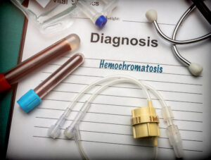 Blood samples and medical chart labeled hemochromatosis diagnosis.