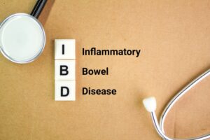 Blocks spelling “IBD” with a stethoscope and text reading “Inflammatory Bowel Disease,” representing digestive and intestinal health.